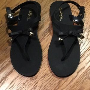 Black sandals with cute bow